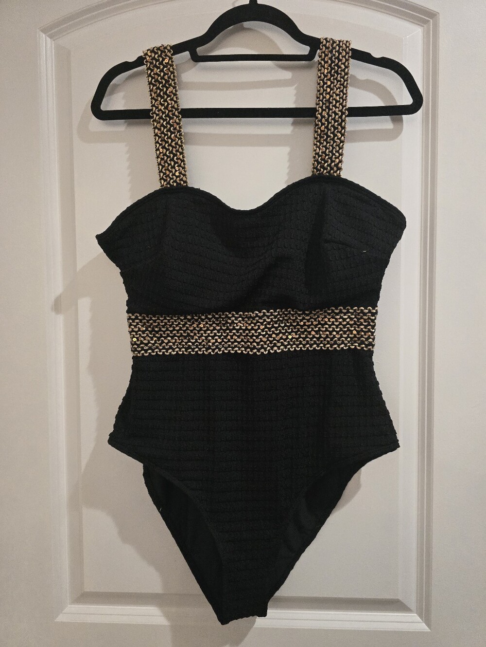 Black One-Piece Swimsuit with Gold Accent
